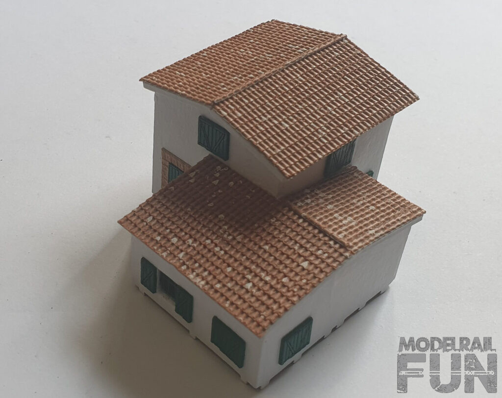 Caserío de carton cortado