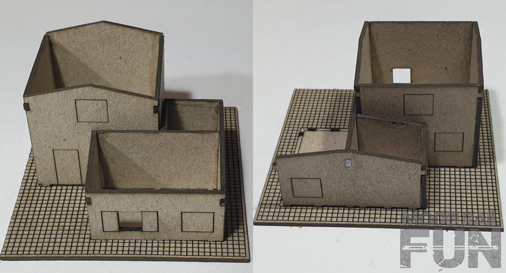 Caserío de carton cortado.Alas anexas